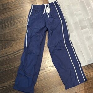 SUPRE Blue Track Pants with White Stripes